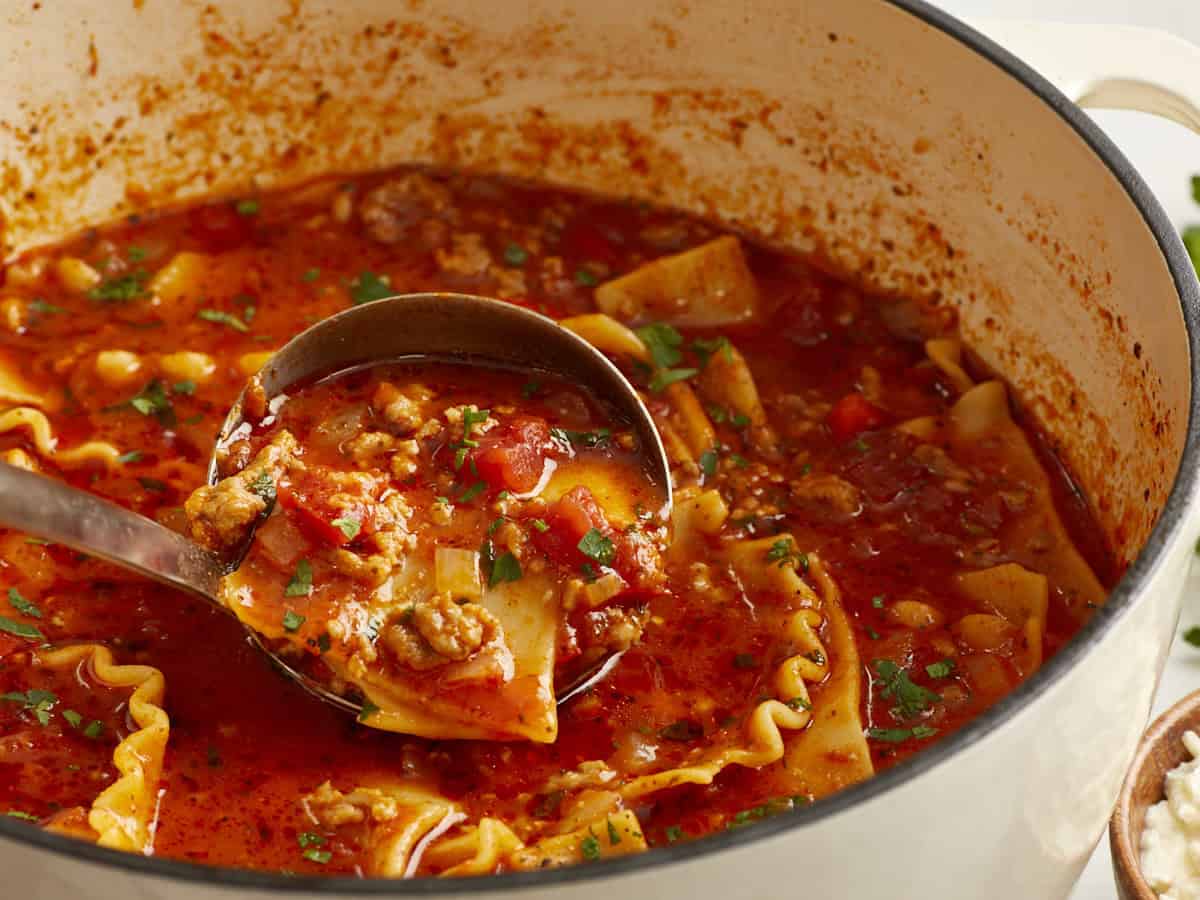 Side view of Lasagna soup in a dutch oven.