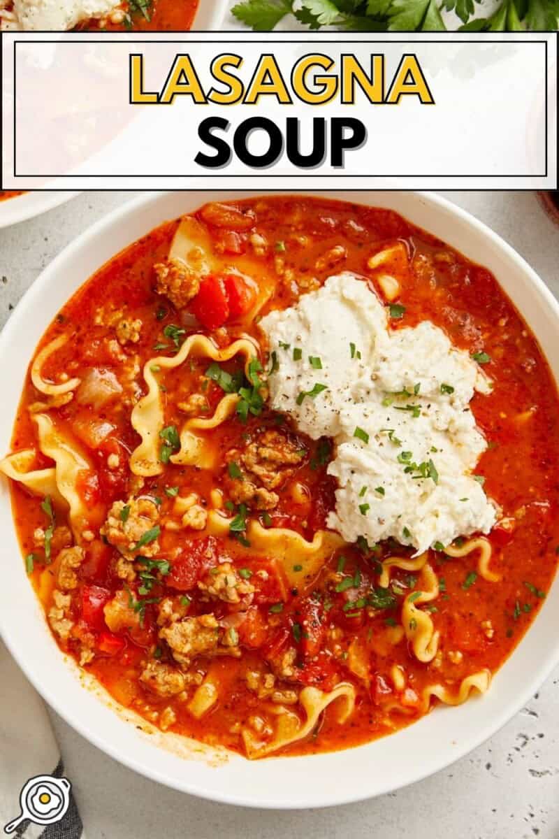 Overhead view of lasagna soup in a white bowl with title text at the top.