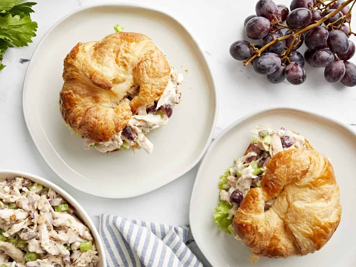 Two croissants filled with traditional chicken salad.