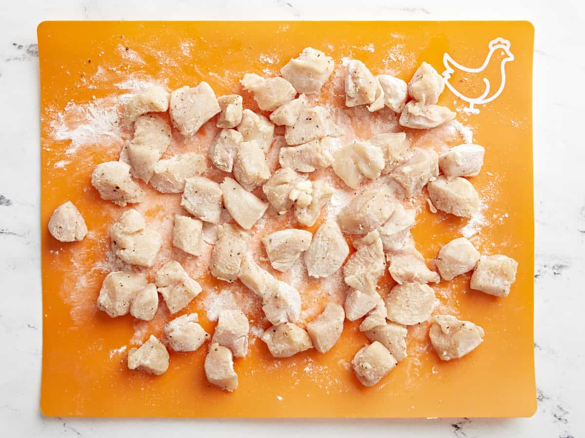 Chicken pieces lightly tossed in flour.