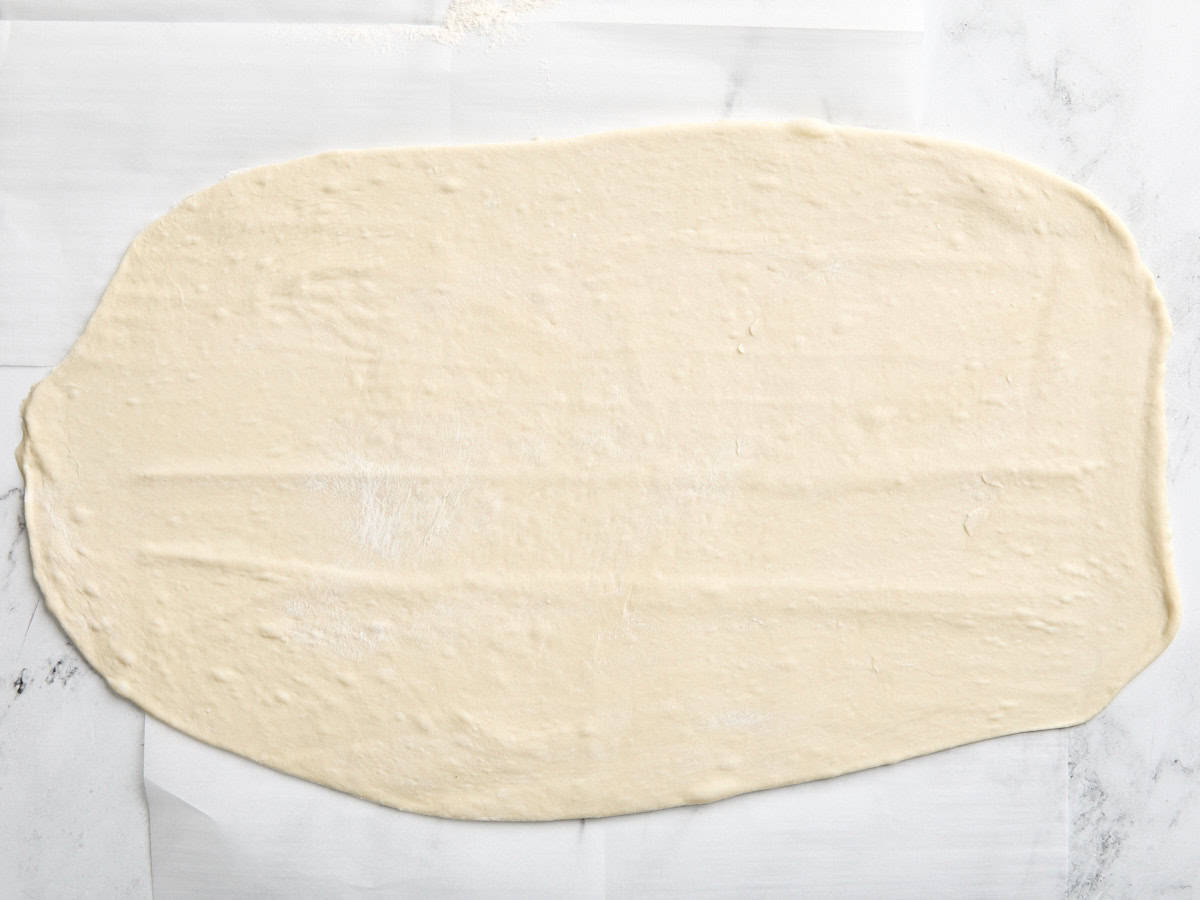 Rolled out pizza dough