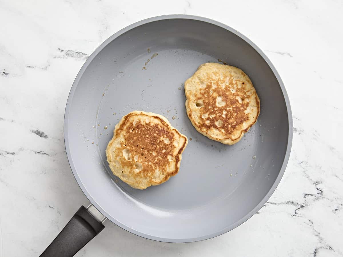 pancakes flipped in skillet.