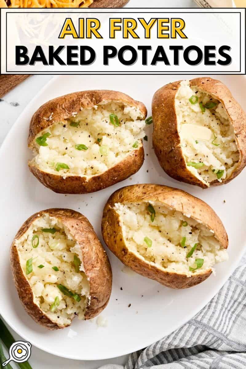 Overhead view of air fryer baked potatoes dressed with toppings on a white platter and title text at the top.