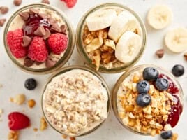 Overhead view of overnight oats with various toppings