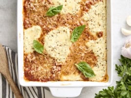 Overhead view of zucchini lasagna in a baking dish