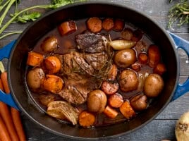 Overhead view of a pot roast in a dutch oven.