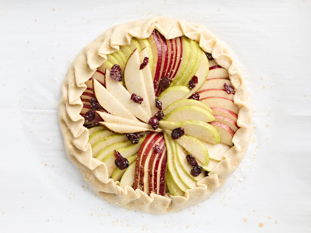 An unbaked pear galette.