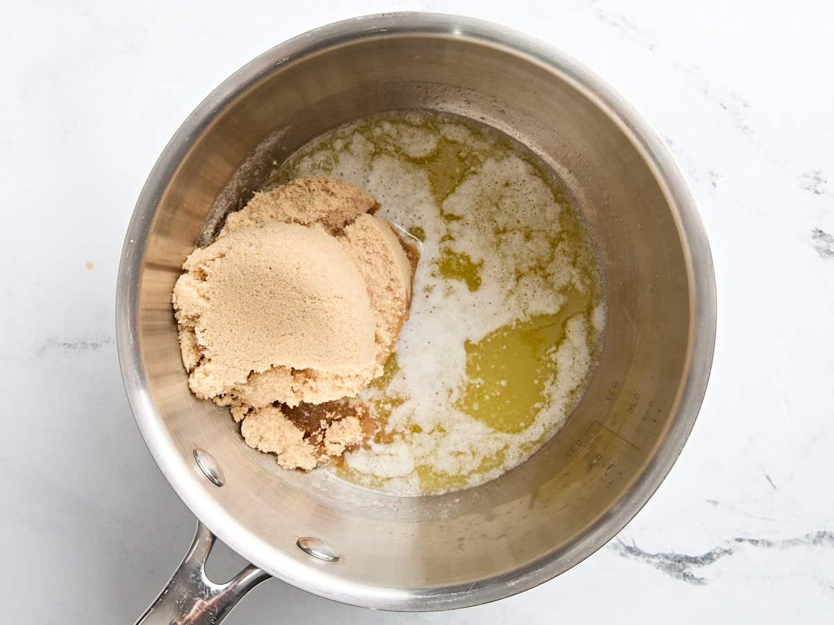 Brown sugar and melted butter in a sauce pan to make caramel sauce.