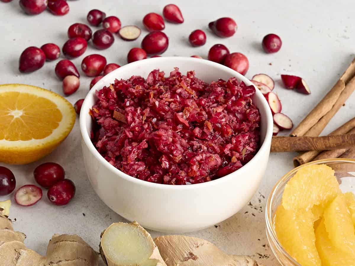 Side view of cranberry orange relish in a bowl.