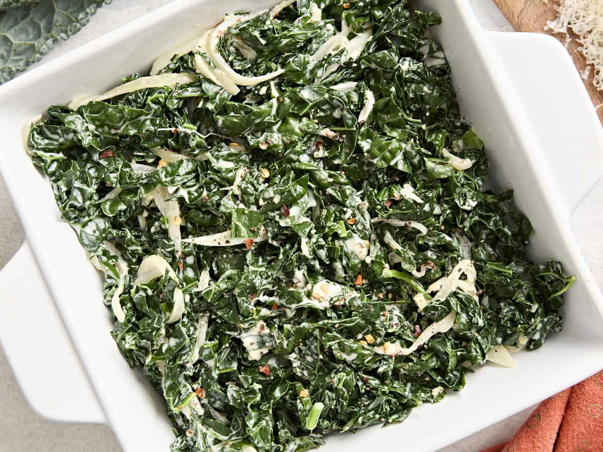 Overhead view of creamed kale in a serving dish.