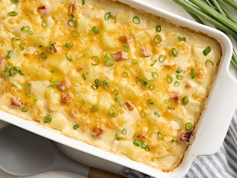 Overhead view of ham and potato casserole in a baking dish.