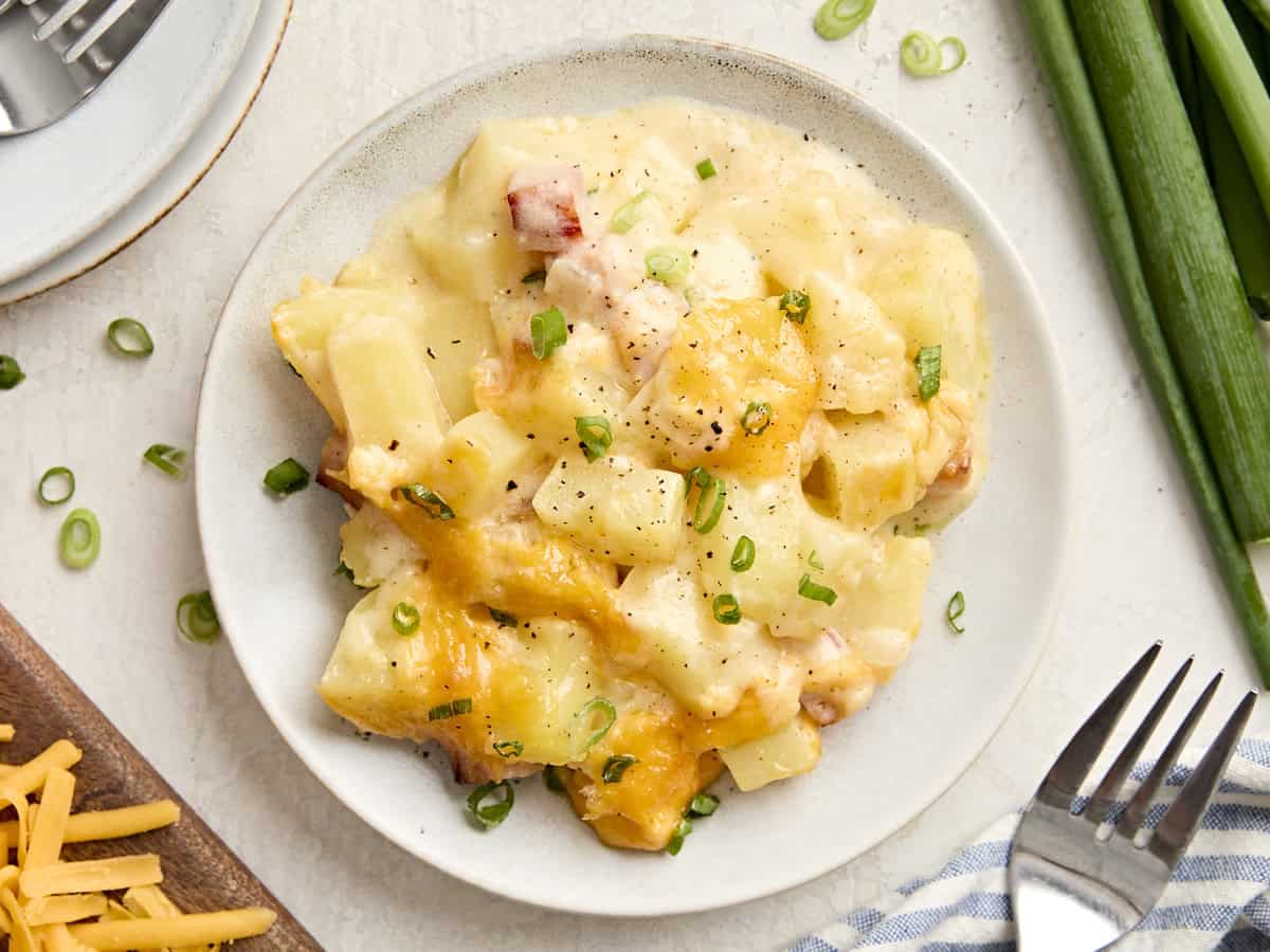 Overhead view of a plate of ham and potato casserole.