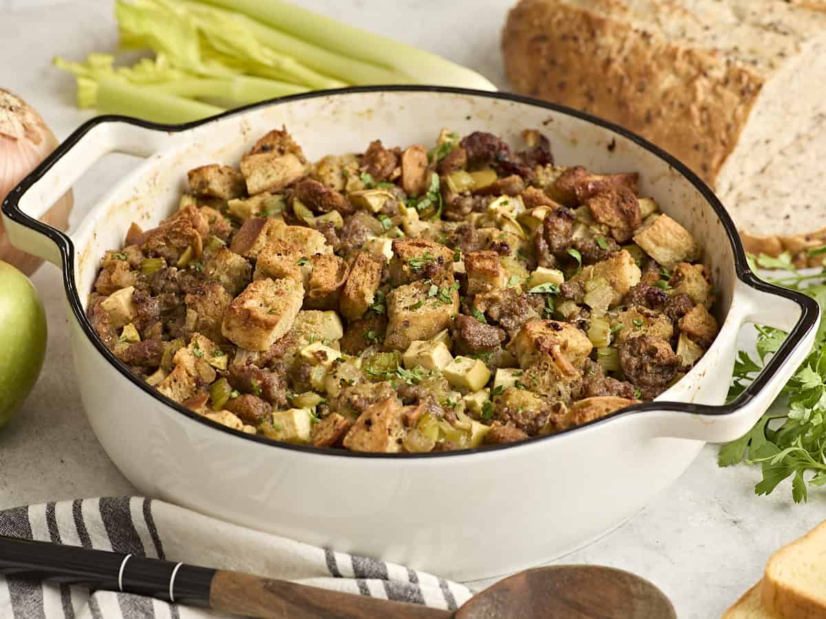 Side view of sausage stuffing in a casserole dish.