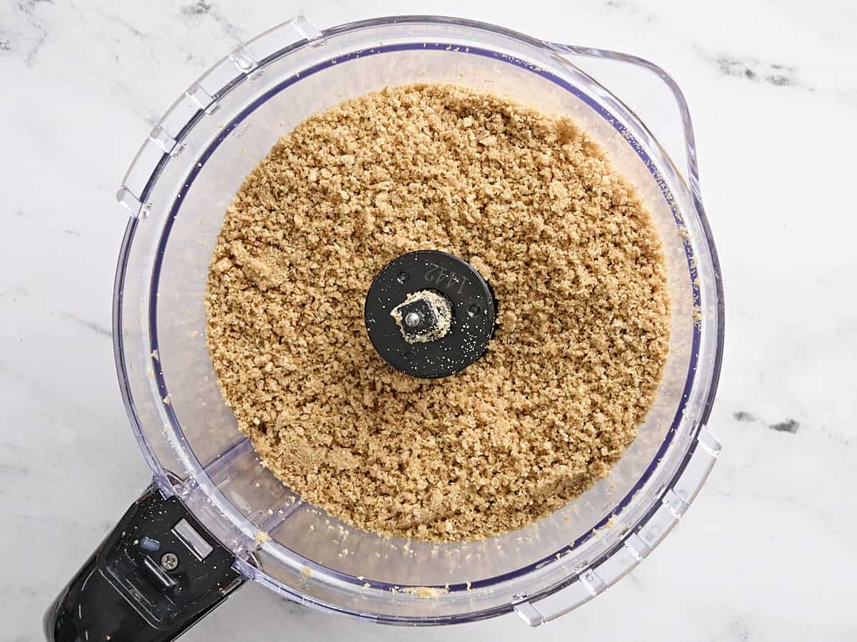 Graham cracker crumbs in a food processor.