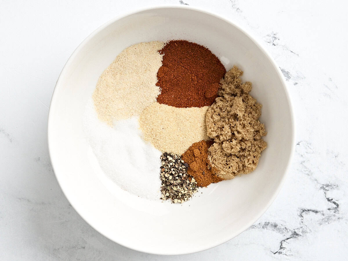 Seasonings for baking chicken breasts in a bowl.