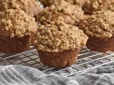 Side view of apple cinnamon muffins.