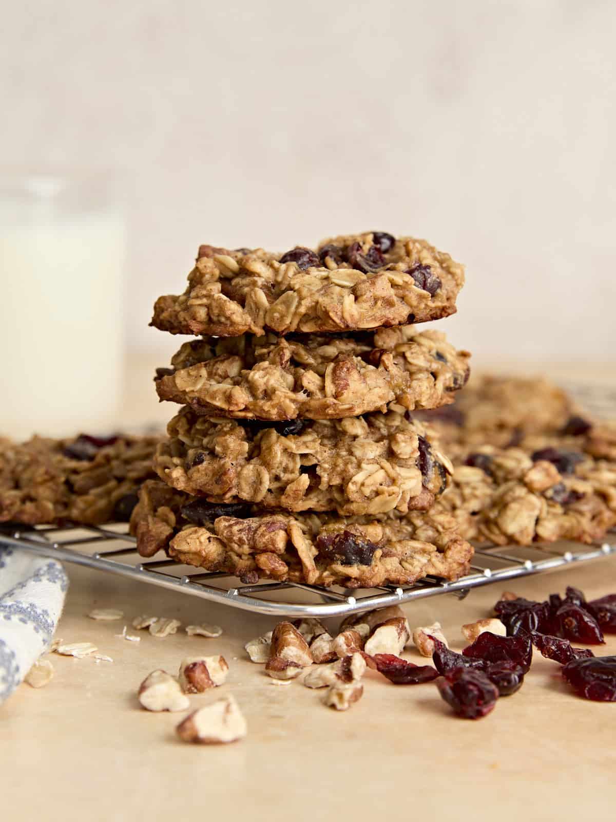 Side view of a stack of breakfast cookies on a plate.