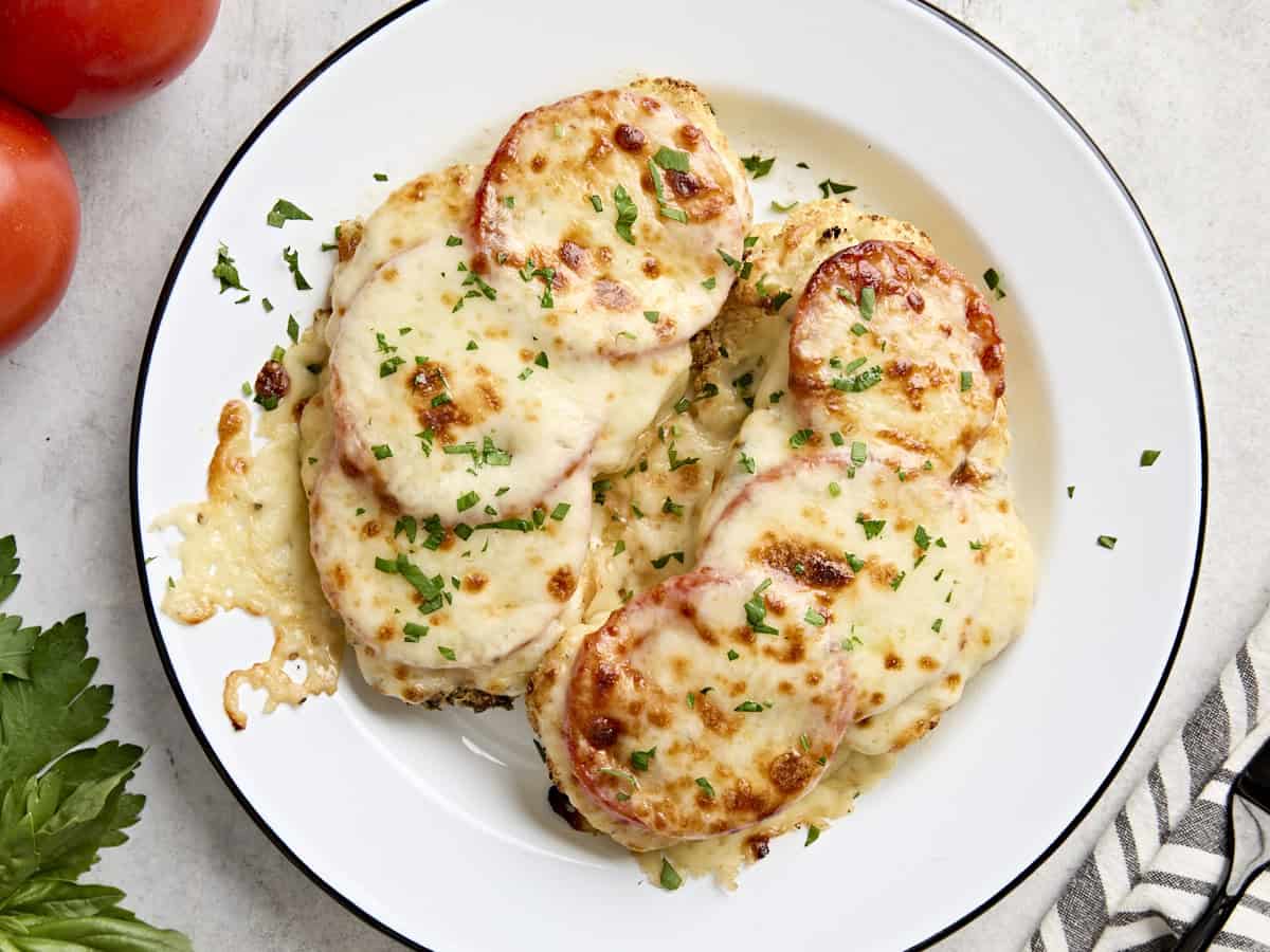 Overhead view of cauliflower parmesan on a plate.