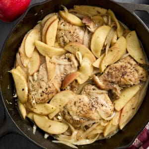 Overhead view of a chicken and apple skillet one pan dinner.