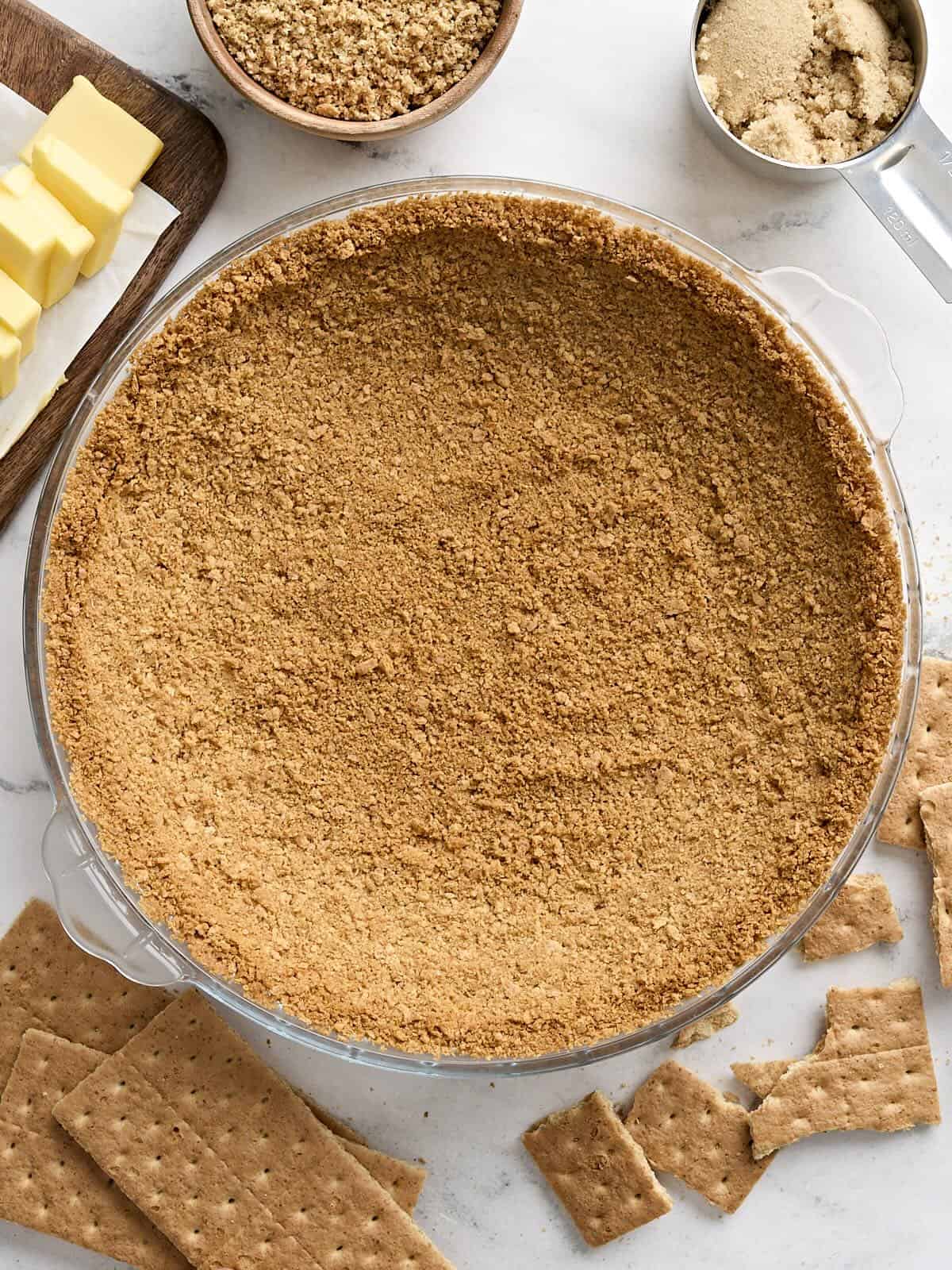 Overhead view of a homemade graham cracker crust.