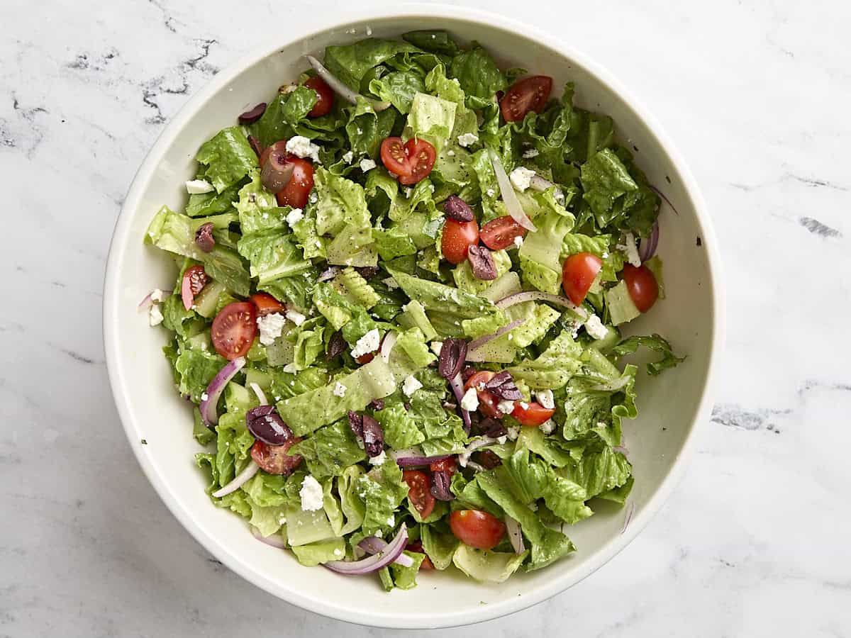 Overhead view of a greek salad in a bowl.