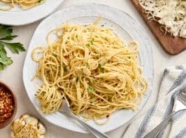 Overhead view of Spaghetti Algio e Olio on a plate with a fork.